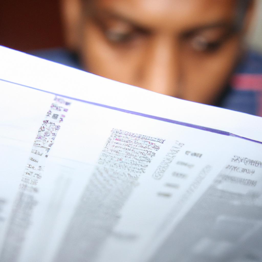 Person reading financial documents,